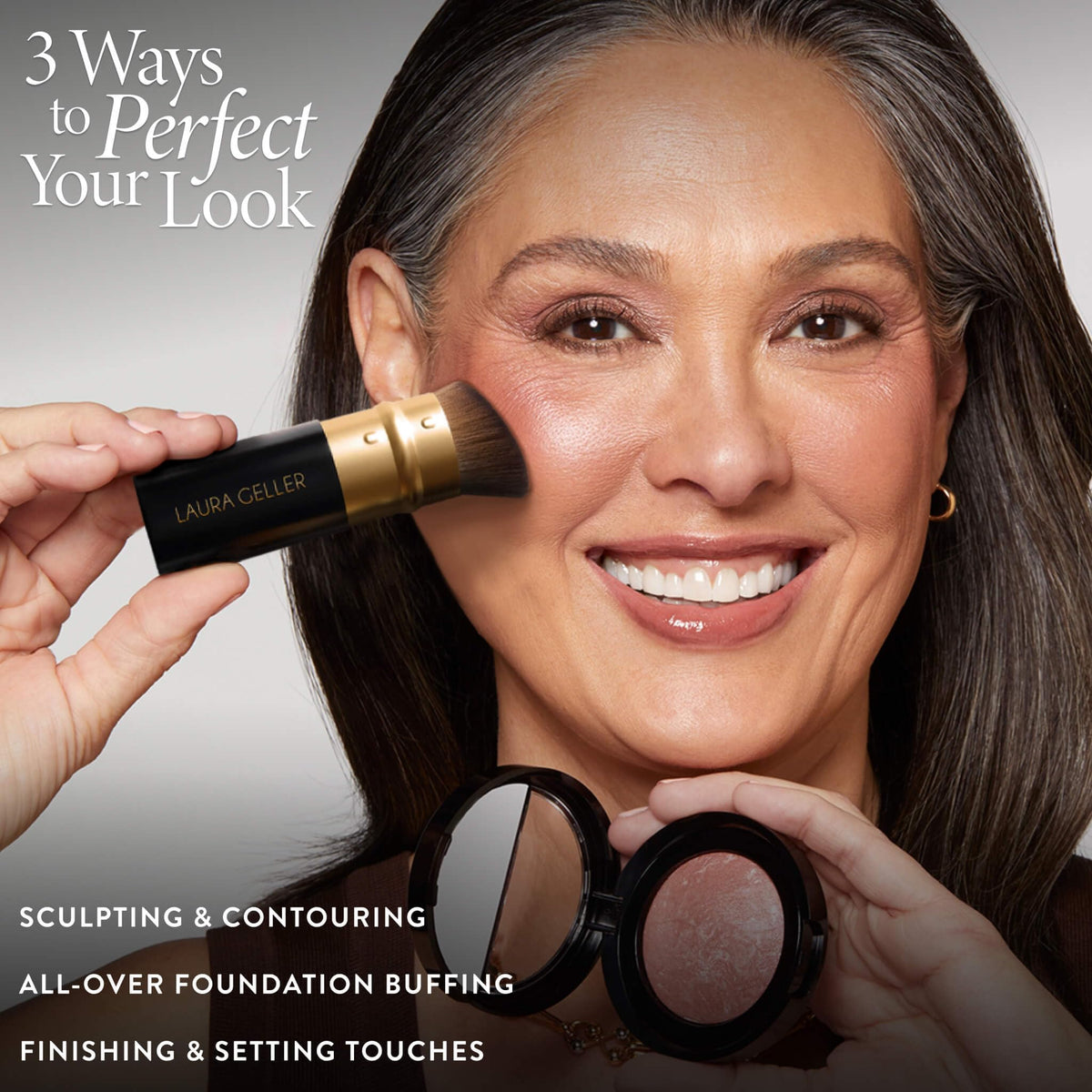 LAURA GELLER NEW YORK brush held in hand illustrating ergonomic scale and control