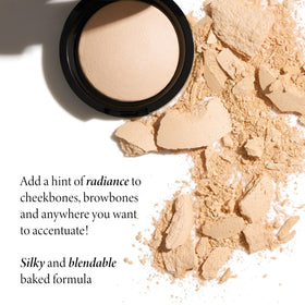 LAURA GELLER NEW YORK model applying highlighter to cheekbone for subtle contour and radiance