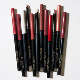 LAURA GELLER NEW YORK clear liner beside lipstick to preserve color