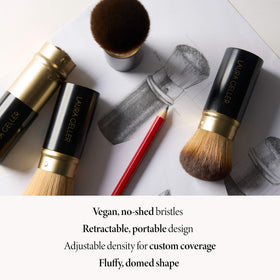 LAURA GELLER NEW YORK side profile of brush head showing rounded shape for blending benefit