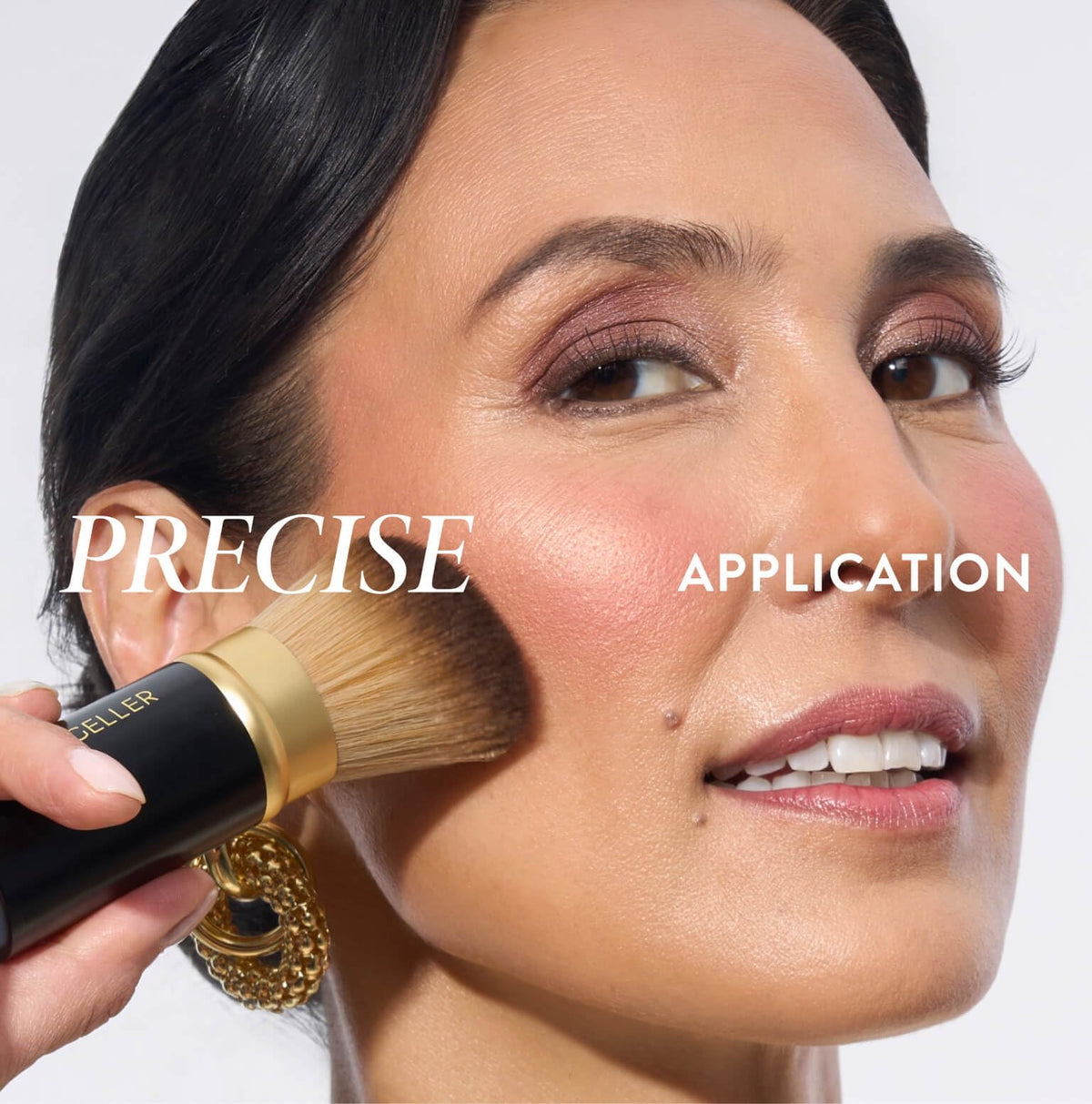 LAURA GELLER NEW YORK brush placed in travel kit for on-the-go touch-ups