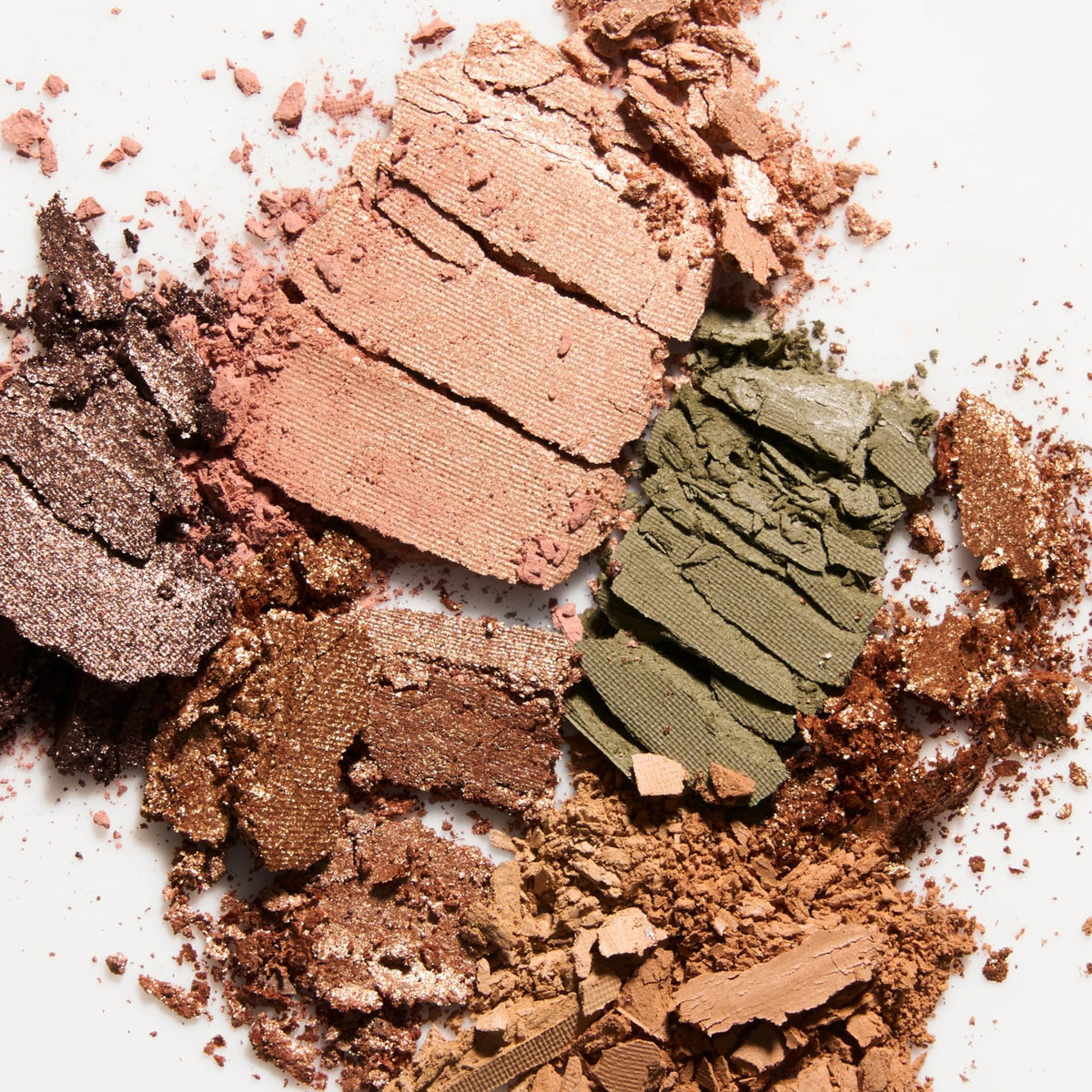 LAURA GELLER NEW YORK palette beside everyday items to show compact size advantage