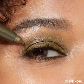 LAURA GELLER NEW YORK swatches on arm showing Olive pigmentation and blendability