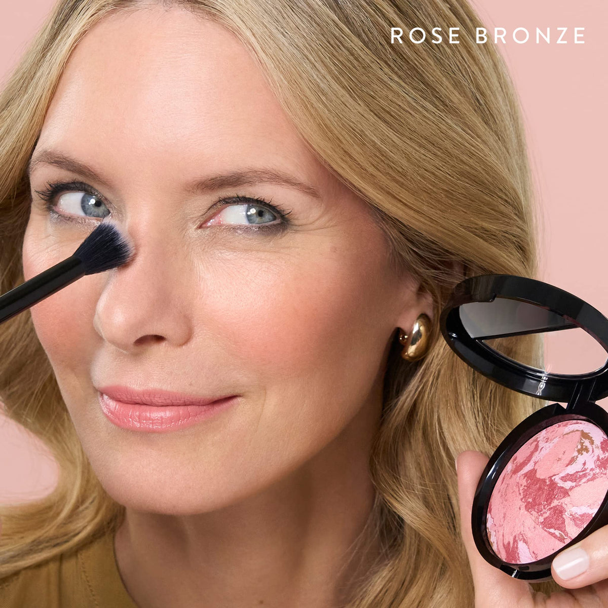 LAURA GELLER NEW YORK open compact on vanity highlighting easy one-step bronzer and blush