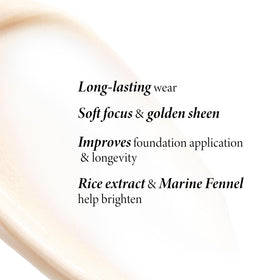 LAURA GELLER NEW YORK Spackle Primer bottle next to foundation illustrating compatibility and layering benefit