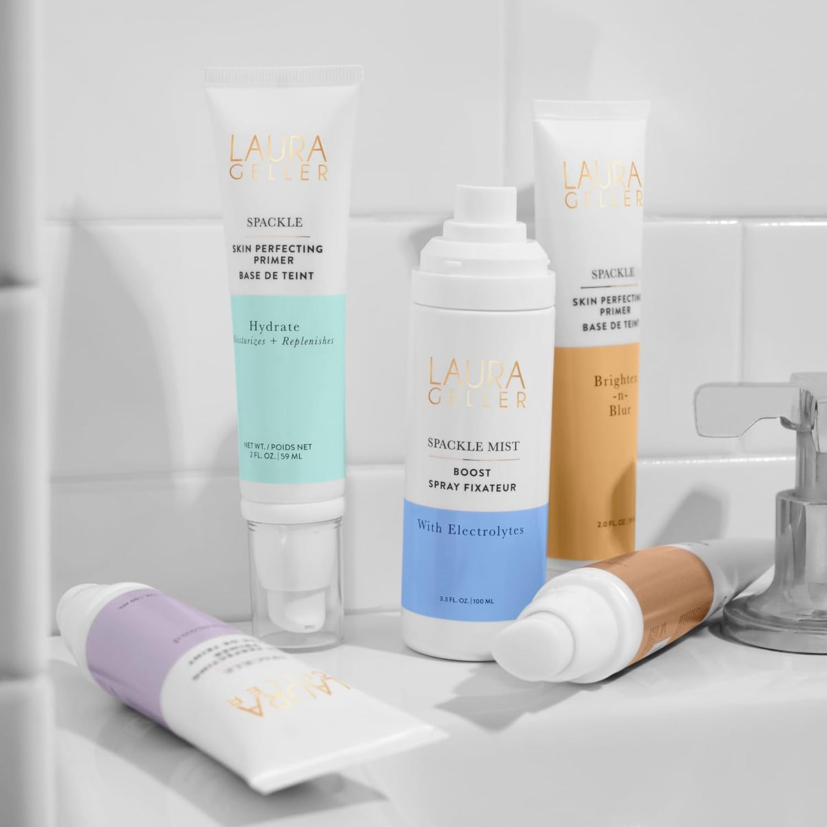 LAURA GELLER spray over finished makeup illustrating long-lasting set and glow