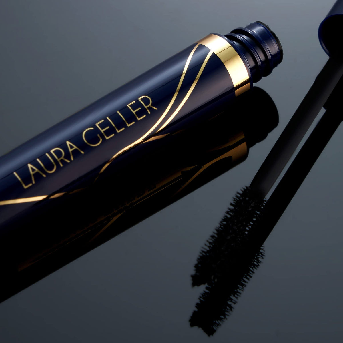 LAURA GELLER NEW YORK texture closeup of black swipe showing creamy non‑clumping formula