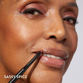 LAURA GELLER NEW YORK applied on model lips showing defined edges and natural finish benefit