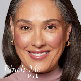 LAURA GELLER applied on cheek showing natural dewy flush and hydration
