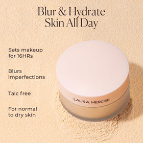 Laura Mercier powder applied with brush demonstrating soft-focus finish benefit