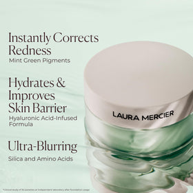 Laura Mercier powder puff with container demonstrating easy touch-up application