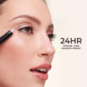 Laura Mercier trio held in hand for size comparison to show travel-friendly mini format