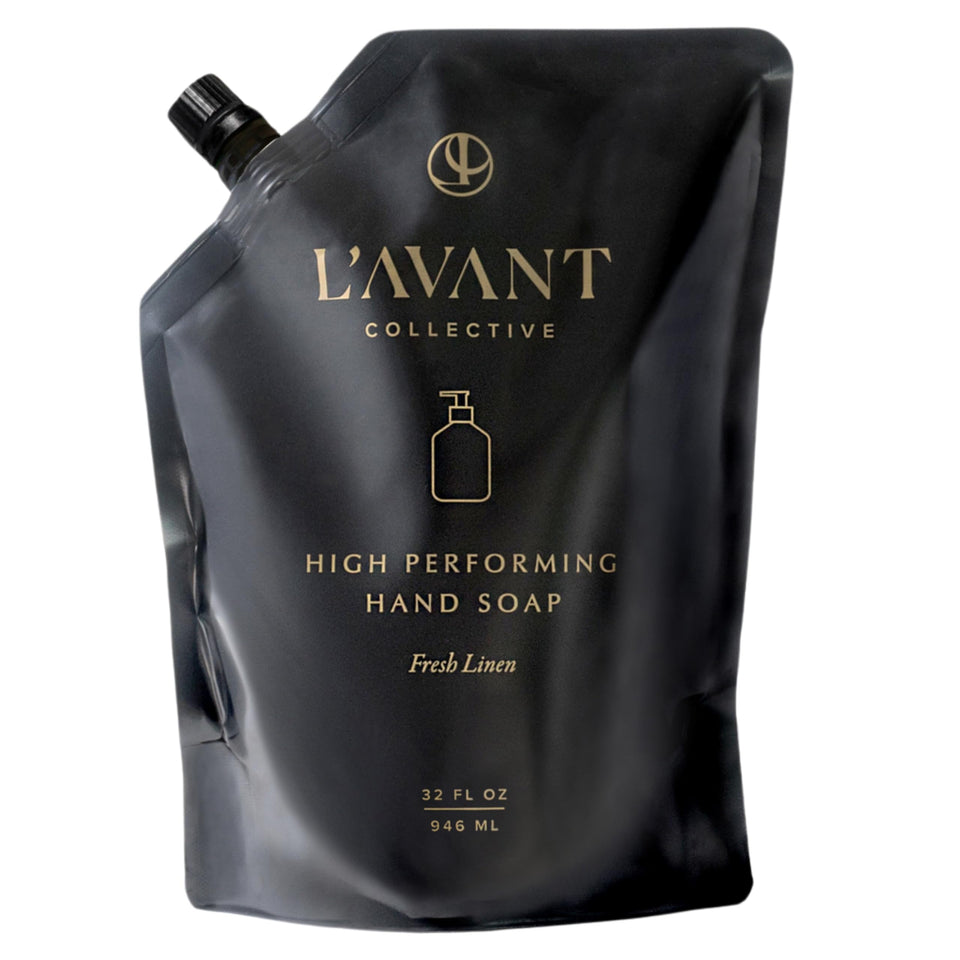 L'AVANT Collective pouch front view showing Fresh Linen refill and branding benefits