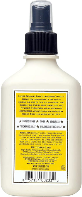 Layrite grooming spray in hand to show 6.7 oz scale and travel‑friendly convenience
