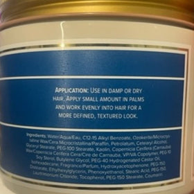 Layrite 1.5 oz jar beside a coin to show compact size and travel-friendly convenience