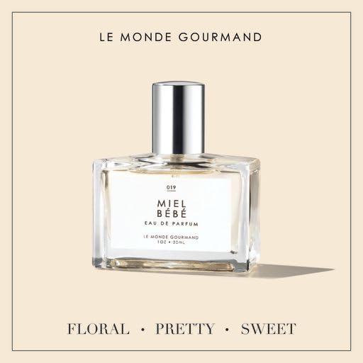 Le Monde Gourmand bottle styled on a brunch table conveying everyday wearable elegance