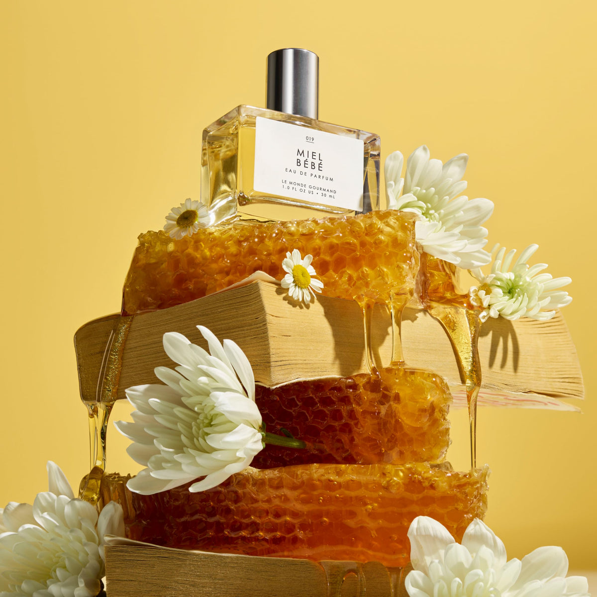 Le Monde Gourmand atomizer and perfume spray texture showing fine mist for even scent