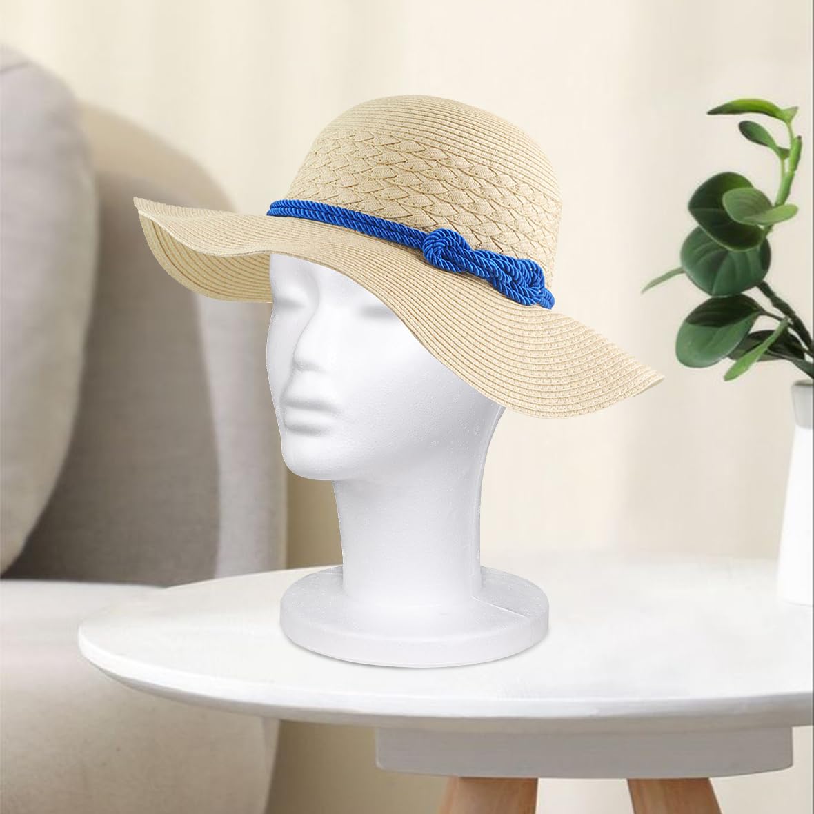 Leeven head attached to tabletop clamp showing hands-free styling benefit