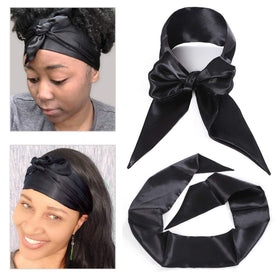 Leeven front flat lay showing two black silky edge scarves, neat presentation and length