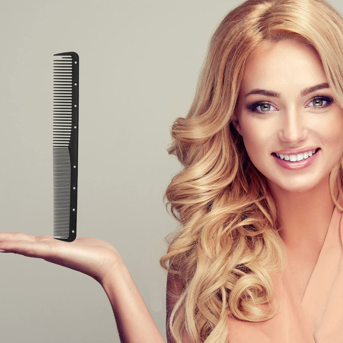 Leinuosen comb held in hand showing size and comfortable grip for styling