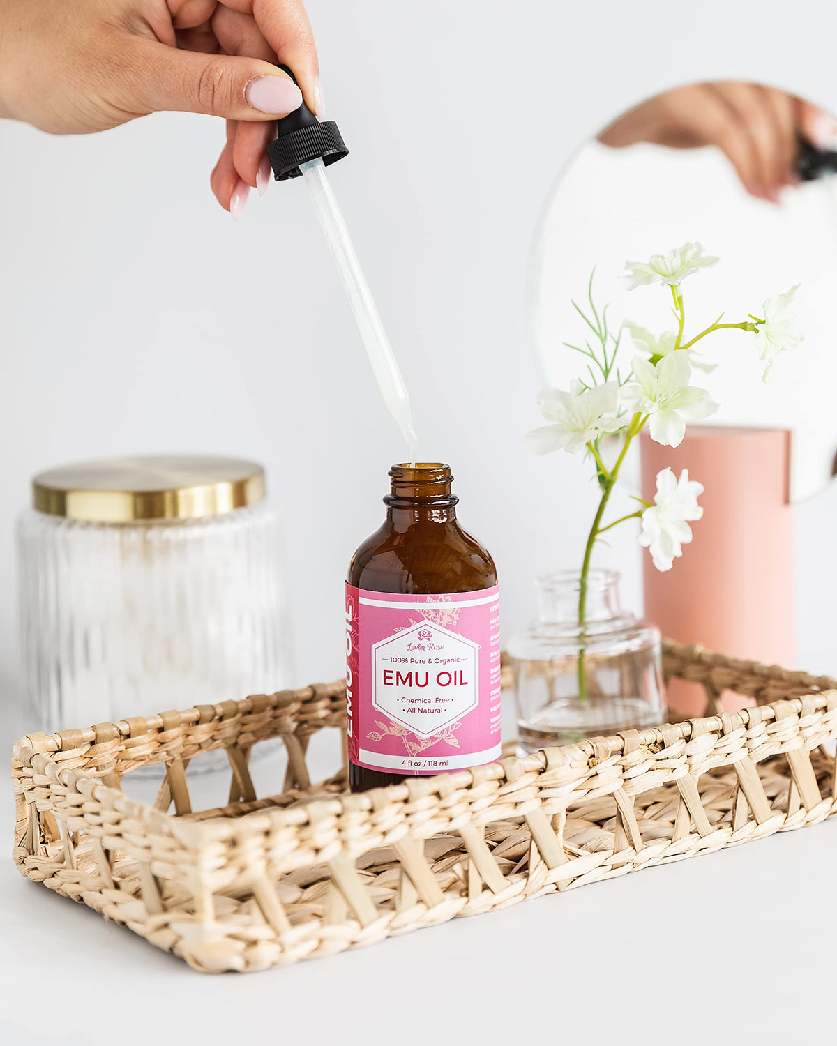 Leven Rose oil drop close-up highlighting smooth texture for hydration and softening
