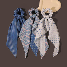 LFOUVRE close-up satin-like fabric texture demonstrating gentle, snag-free hair protection