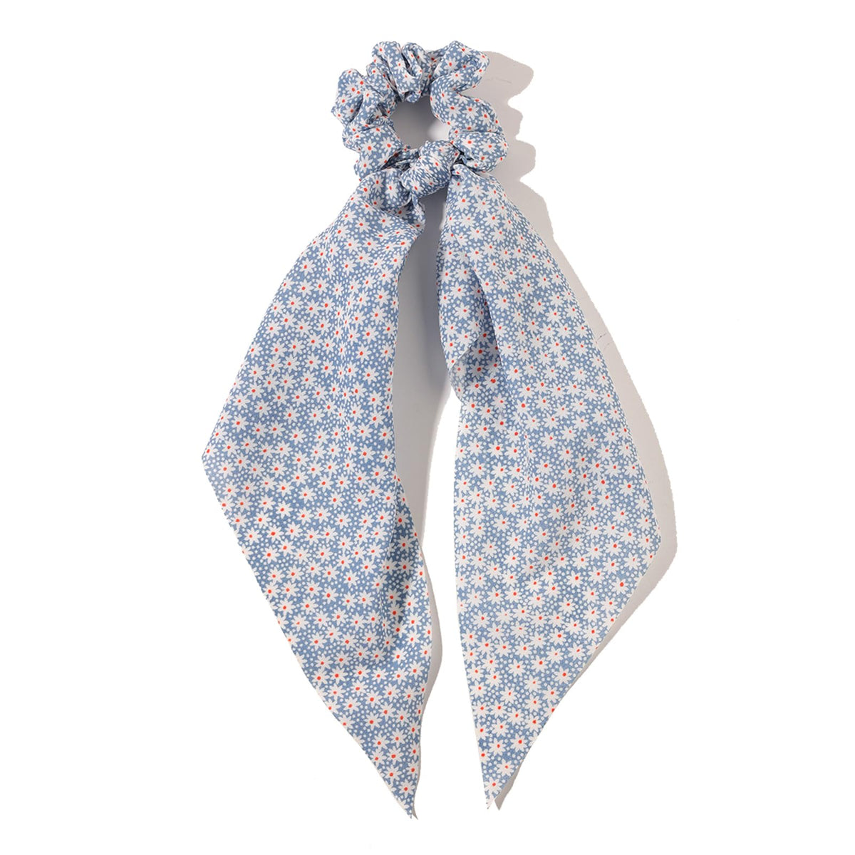 LFOUVRE scrunchie worn as wrist accessory showing dual-purpose fashion and convenience