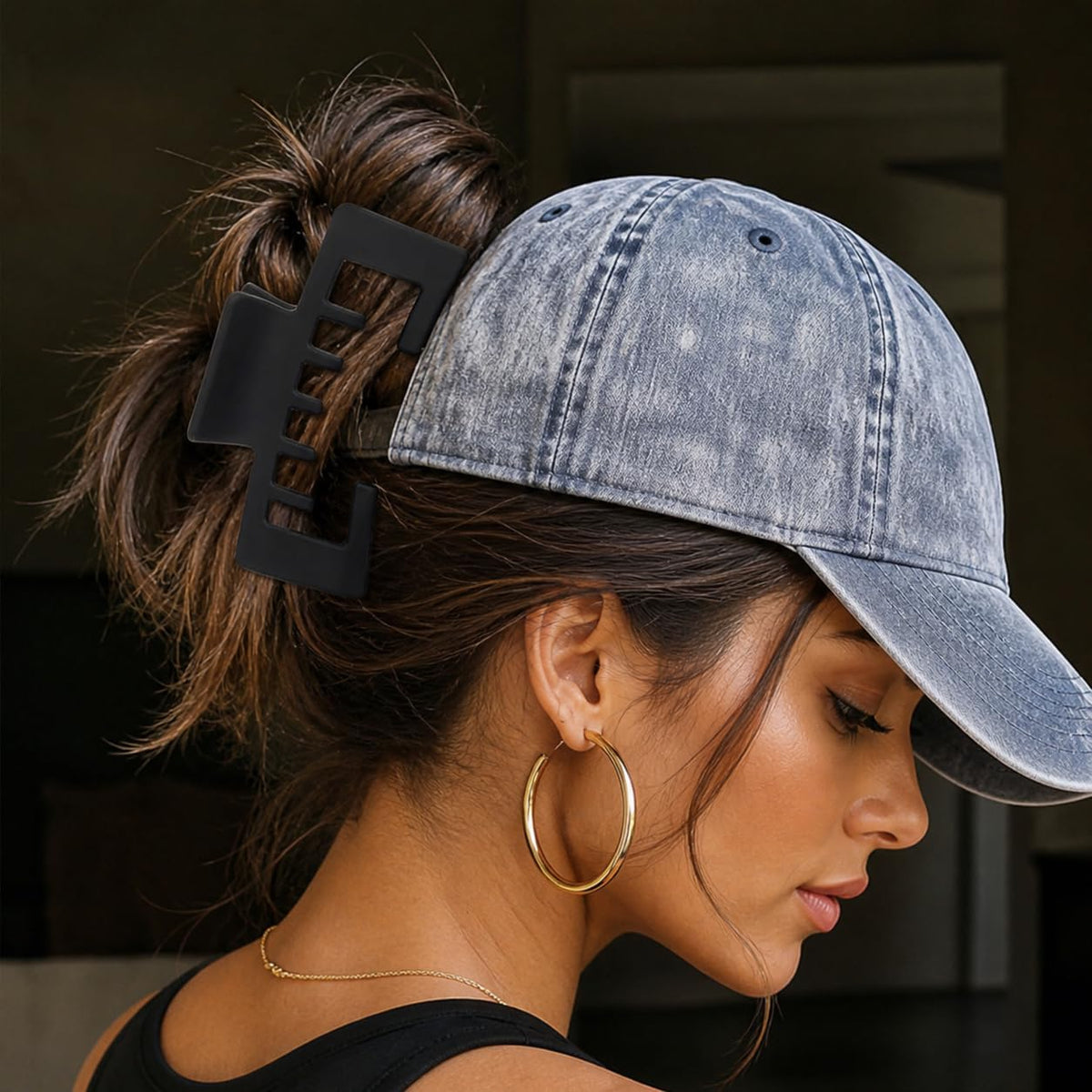 Liayozl in-hat demonstration securing hair under trucker hat for comfort