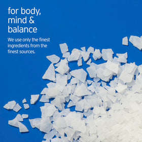 LIFE-FLO flakes dissolving in warm bathtub demonstrating quick-dissolve benefit