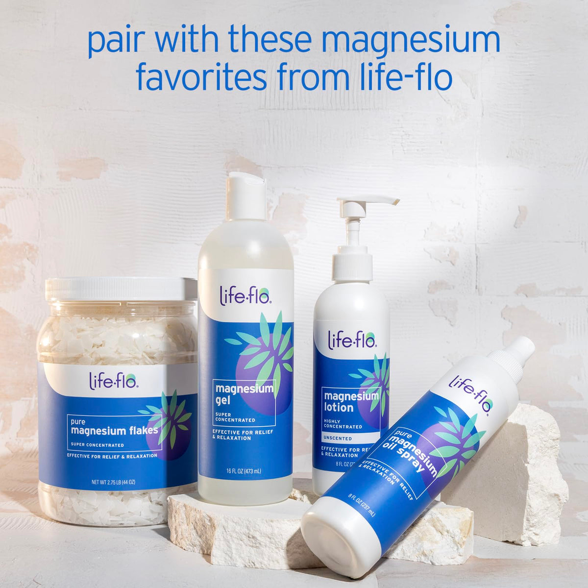 LIFE-FLO bottle next to towel in bathroom illustrating daily use convenience