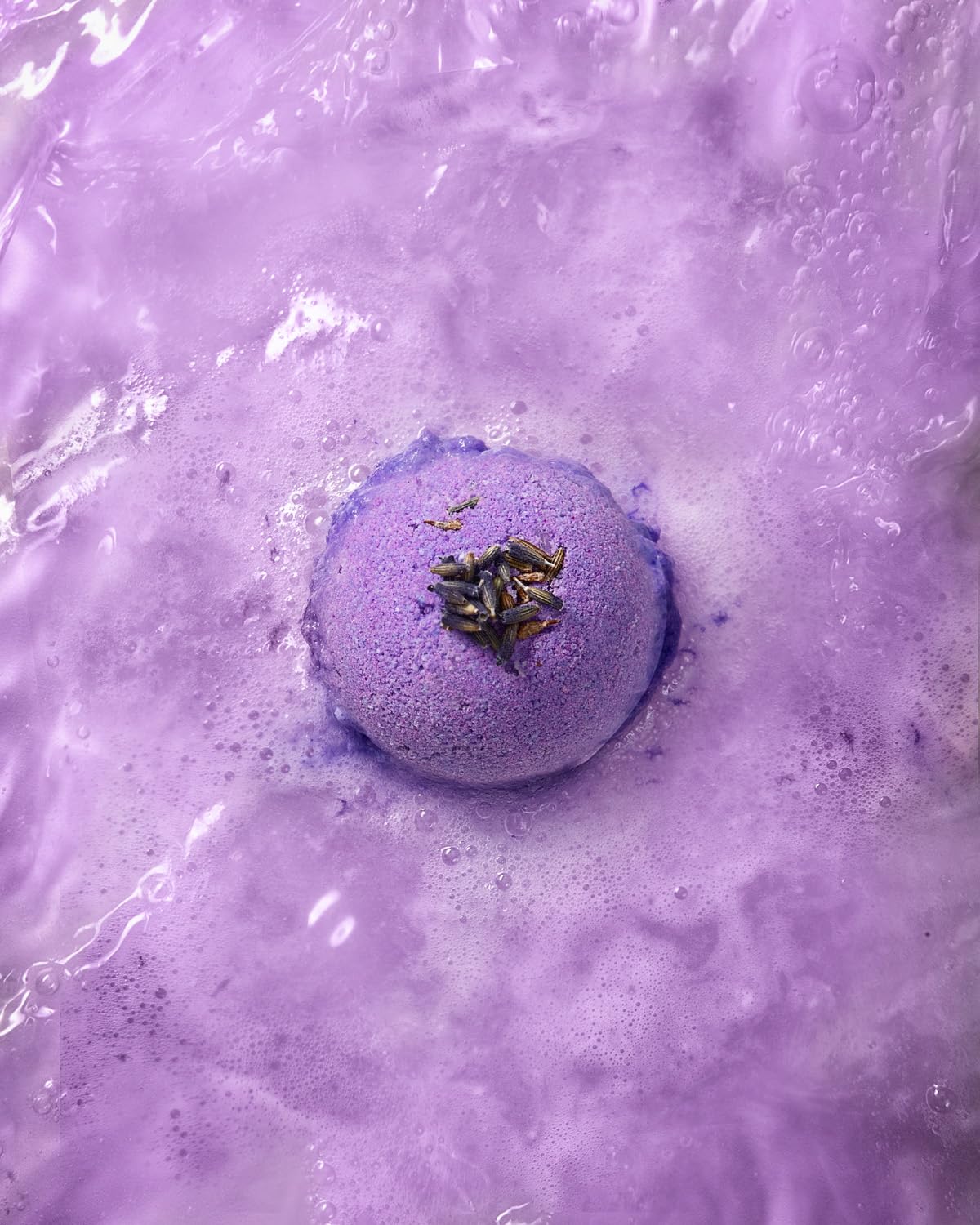 LifeAround2Angels bath bomb fizzing in tub demonstrating lively effervescence