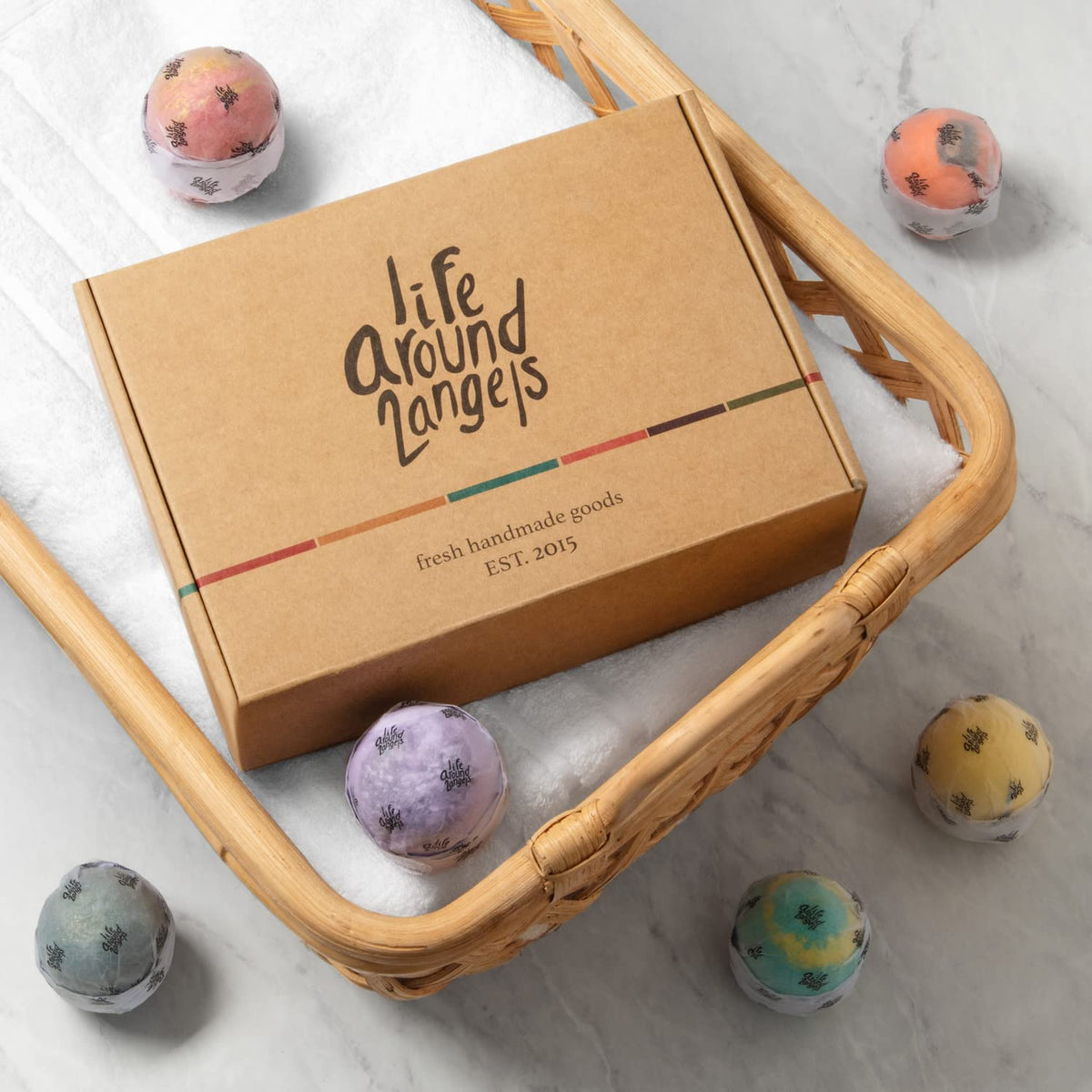 LifeAround2Angels colorful bathwater display showing vibrant non-staining colors