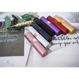 Lil Ray atomizer inside purse for on-the-go touch-ups and portability