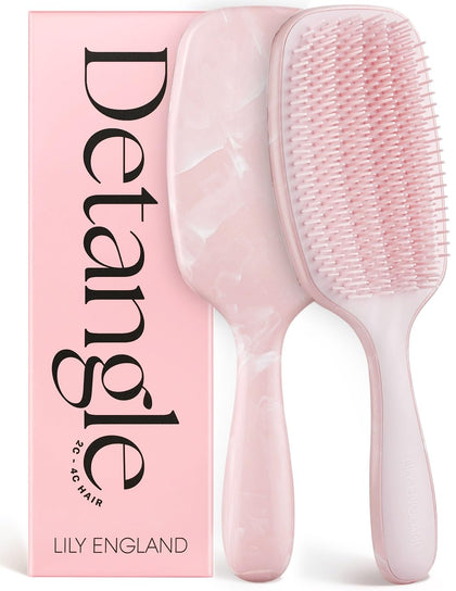 Lily England brush front view showing compact pink design and easy hold