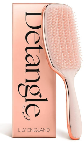 Lily England brush front view showing rose gold finish and curved shape, easy styling benefit