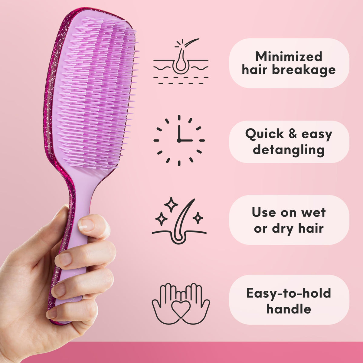 Lily England brush held in hand highlighting ergonomic grip for controlled styling