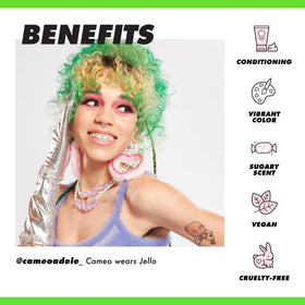 Lime Crime Jello swatch on bleached hair showing vibrant tropical green payoff