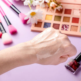 Linyuthia palette in use blending foundation on hand for quick color checks