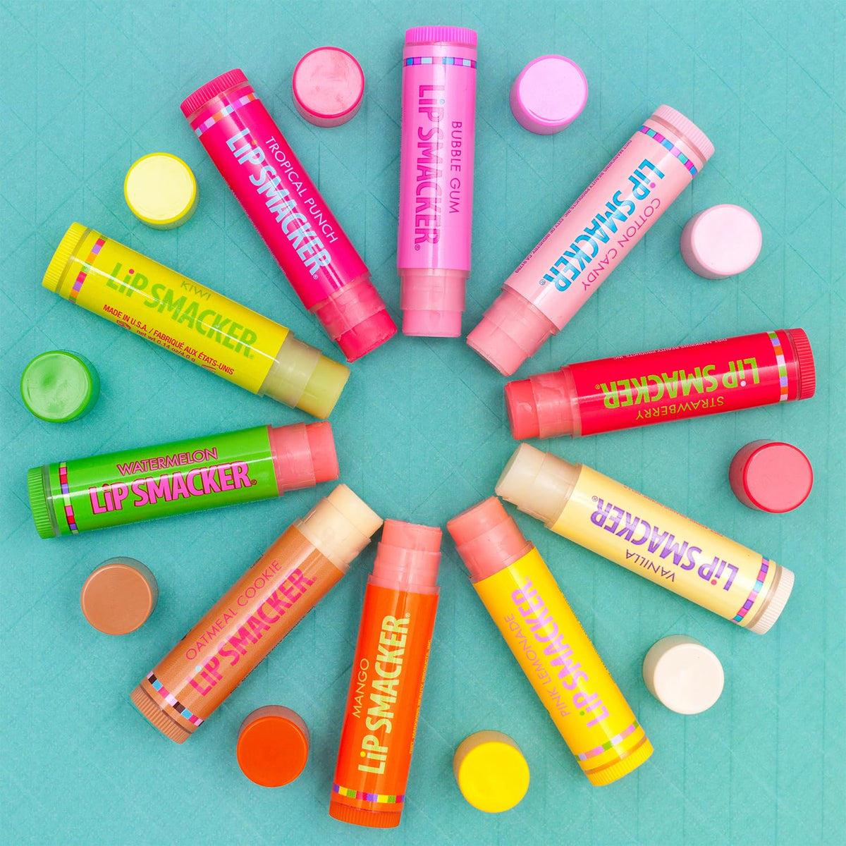 Hand holding Lip Smacker tube for scale showing brand portability and travel-ready convenience