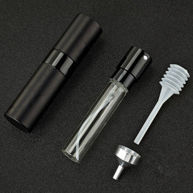 LISAPACK atomizer with open glass vial exposed for easy refill benefit