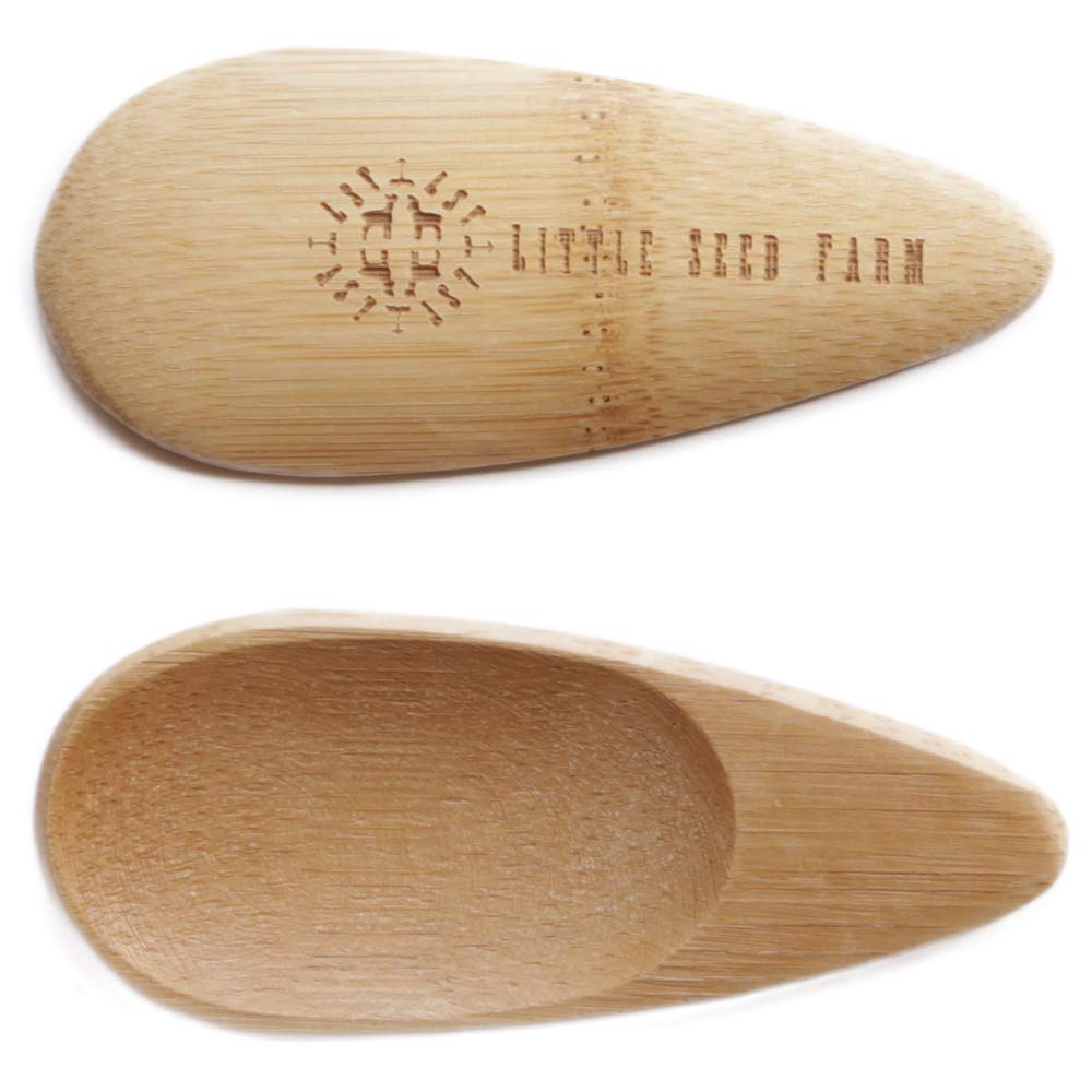 Little Seed Farm applicator front view showing smooth bamboo finish and ergonomic shape for precise application