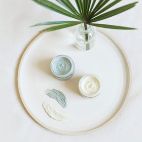 Little Seed Farm jar next to ruler to show 2.4oz size and travel-ready benefit