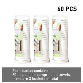 LiveFull compressed towel next to coin showing compact size and portability