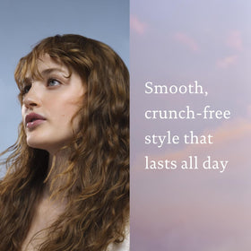 Living Proof styler being applied to damp hair for faster drying and styling