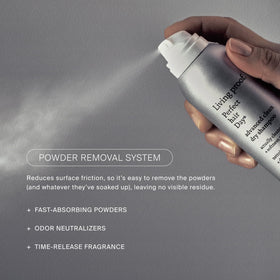 Living Proof bottle held in hand for size scale and travel convenience
