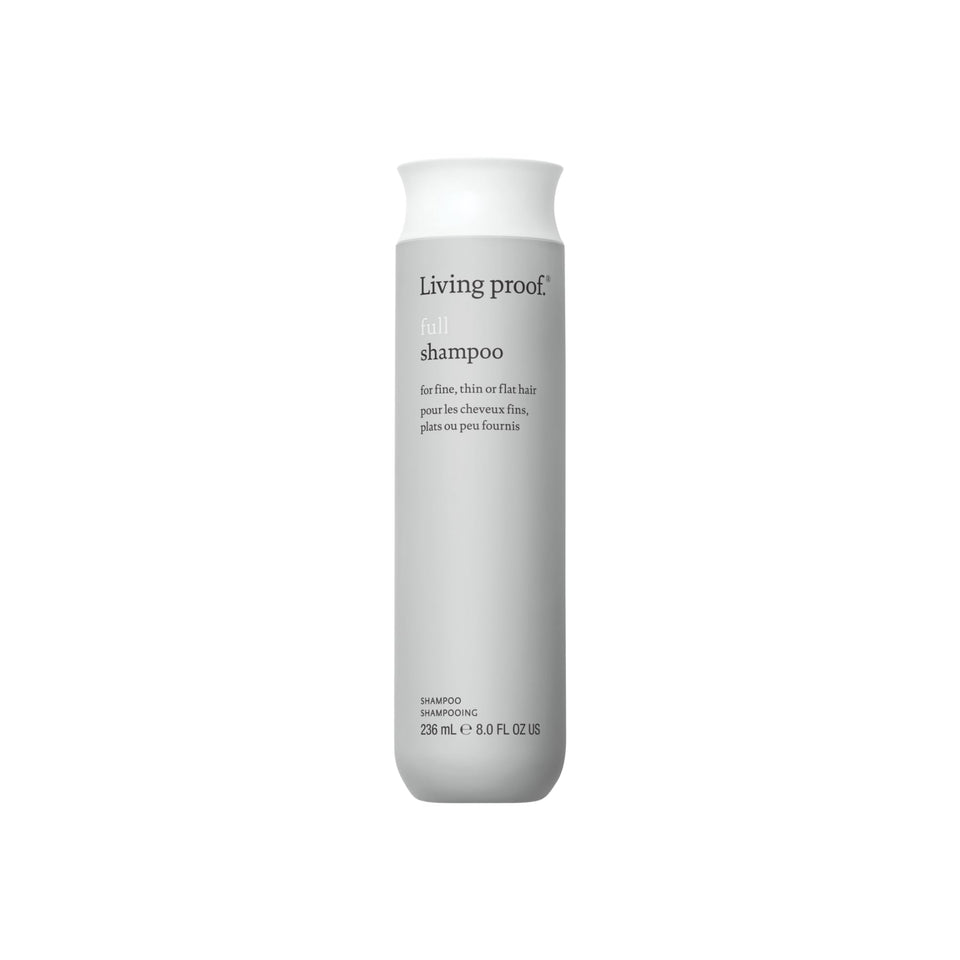 Living Proof bottle front view showing brand and volumizing benefit