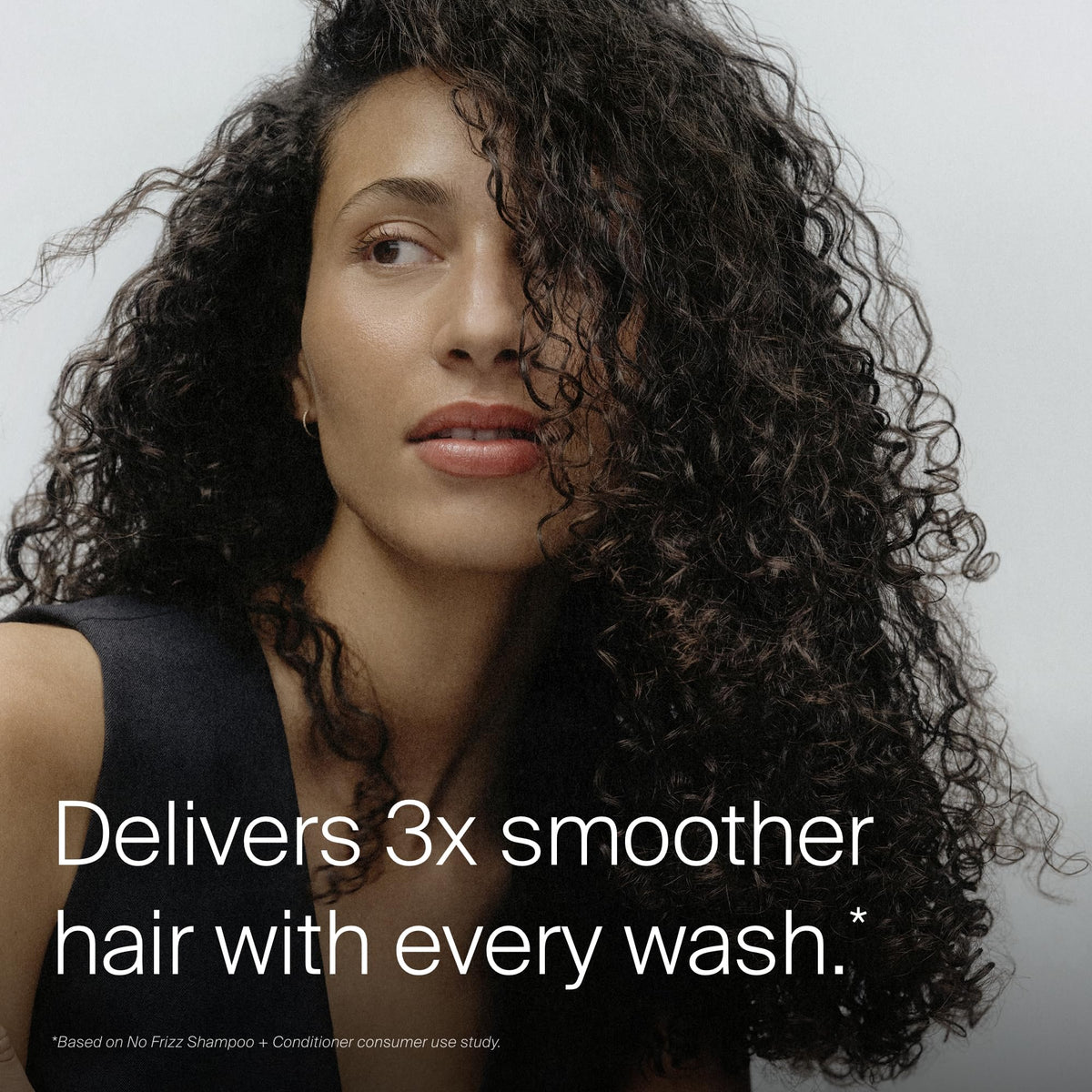 Living Proof shampoo on wet hair showing effective cleansing and smoother strands