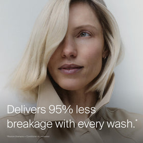 Living Proof shampoo poured into hand illustrating easy application and foam