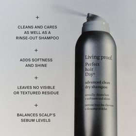 Living Proof texture spray fine mist sprayed into hand demonstrating lightweight lift benefit