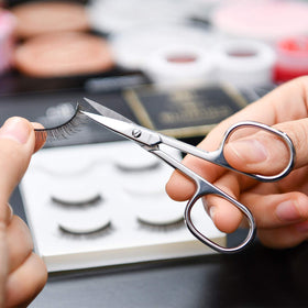 LIVINGO flat-lay with scissors in travel kit showing convenience for on-the-go maintenance